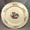 Wedgwood creamware 15" charger decorated with a puce transferware of ancient ruins.